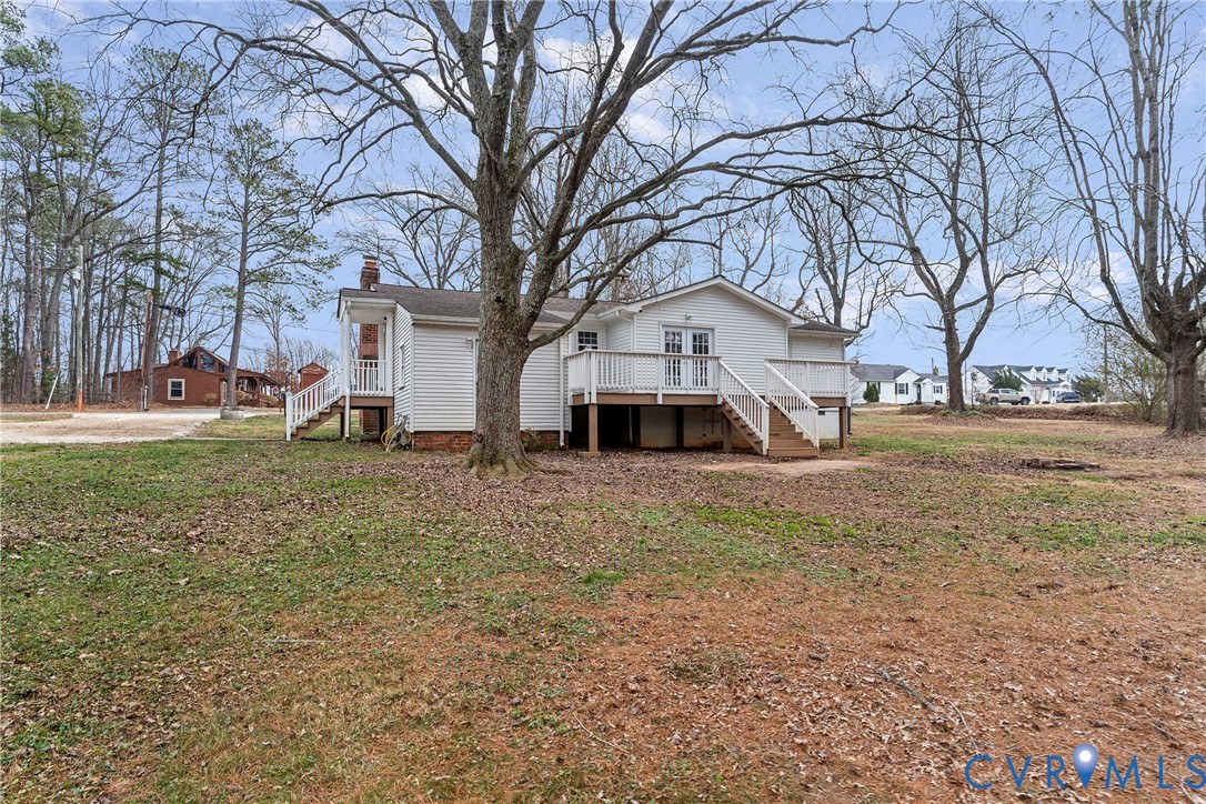 15141 Brown Pleasants Road Montpelier, VA 23192 - Photo 38 of 46 Rear view of property featuring a chimney, stairwa