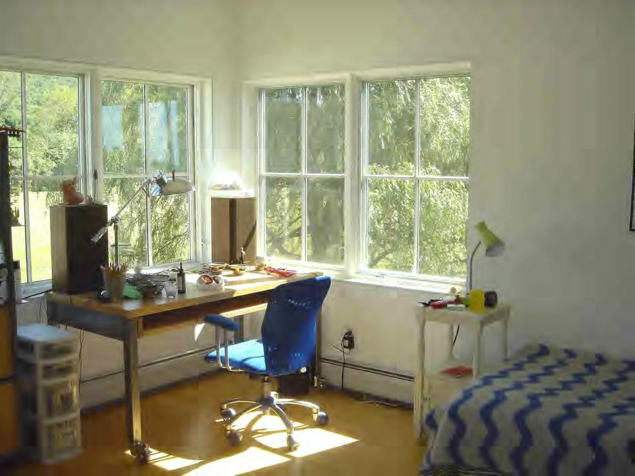 34 Prospect Hill Road Stockbridge, MA 01262 - Photo 11 of 12 a bed room with a bed and a window