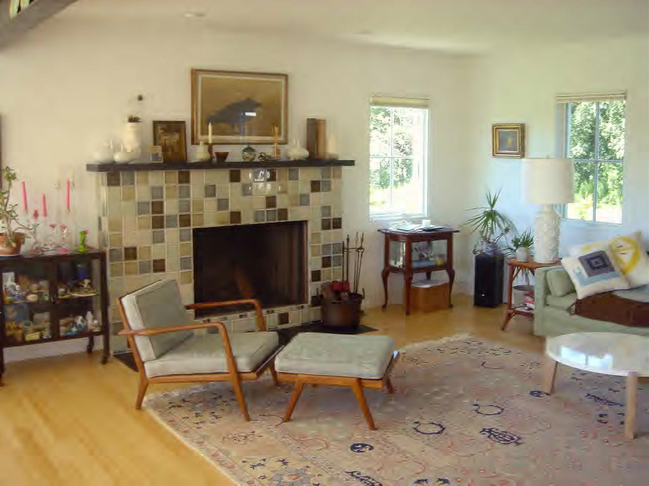 34 Prospect Hill Road Stockbridge, MA 01262 - Photo 5 of 12 a living room with furniture and a fireplace