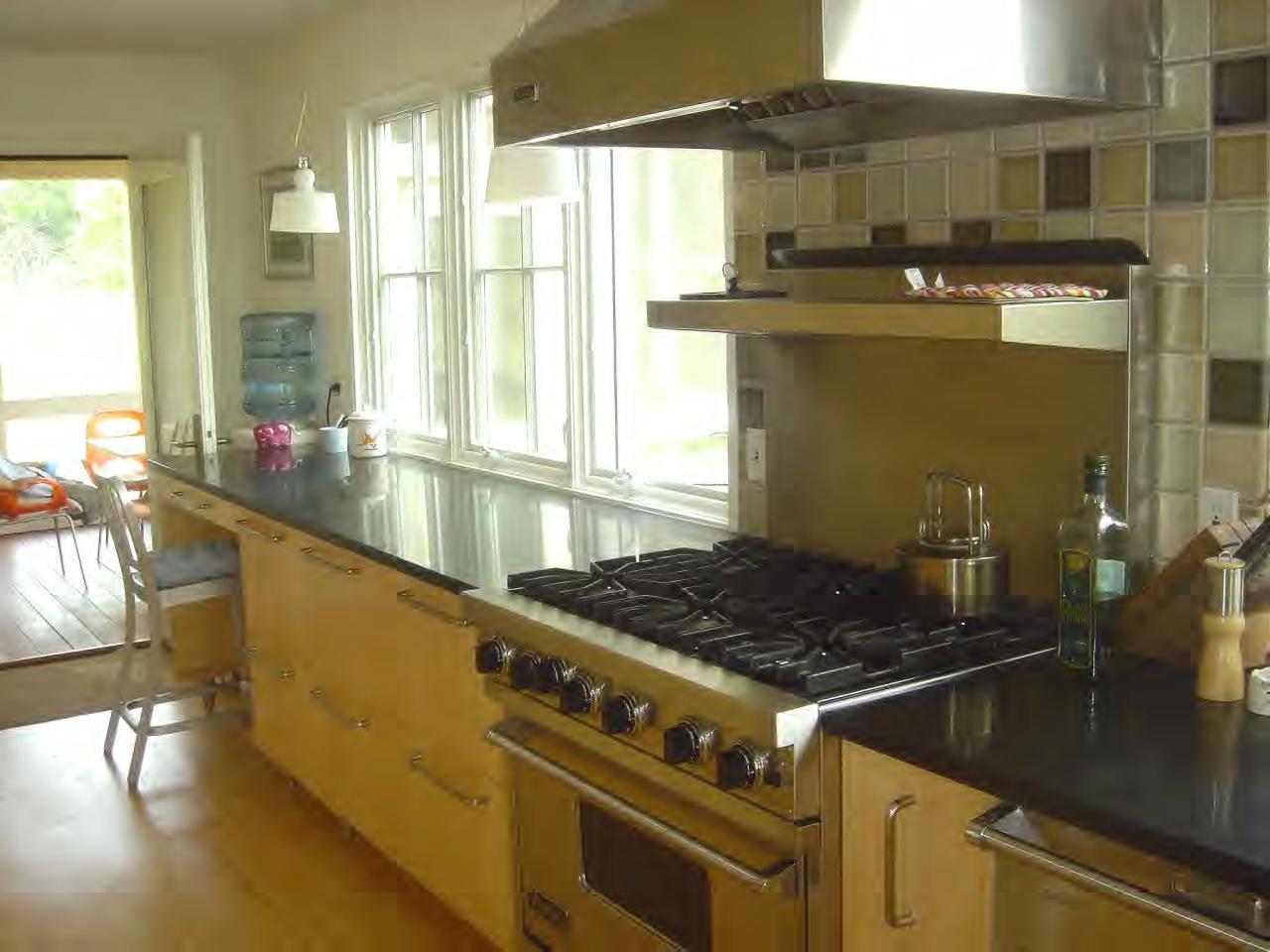 34 Prospect Hill Road Stockbridge, MA 01262 - Photo 6 of 12 a kitchen with stainless steel appliances granite countertop a stove a sink and a microwave