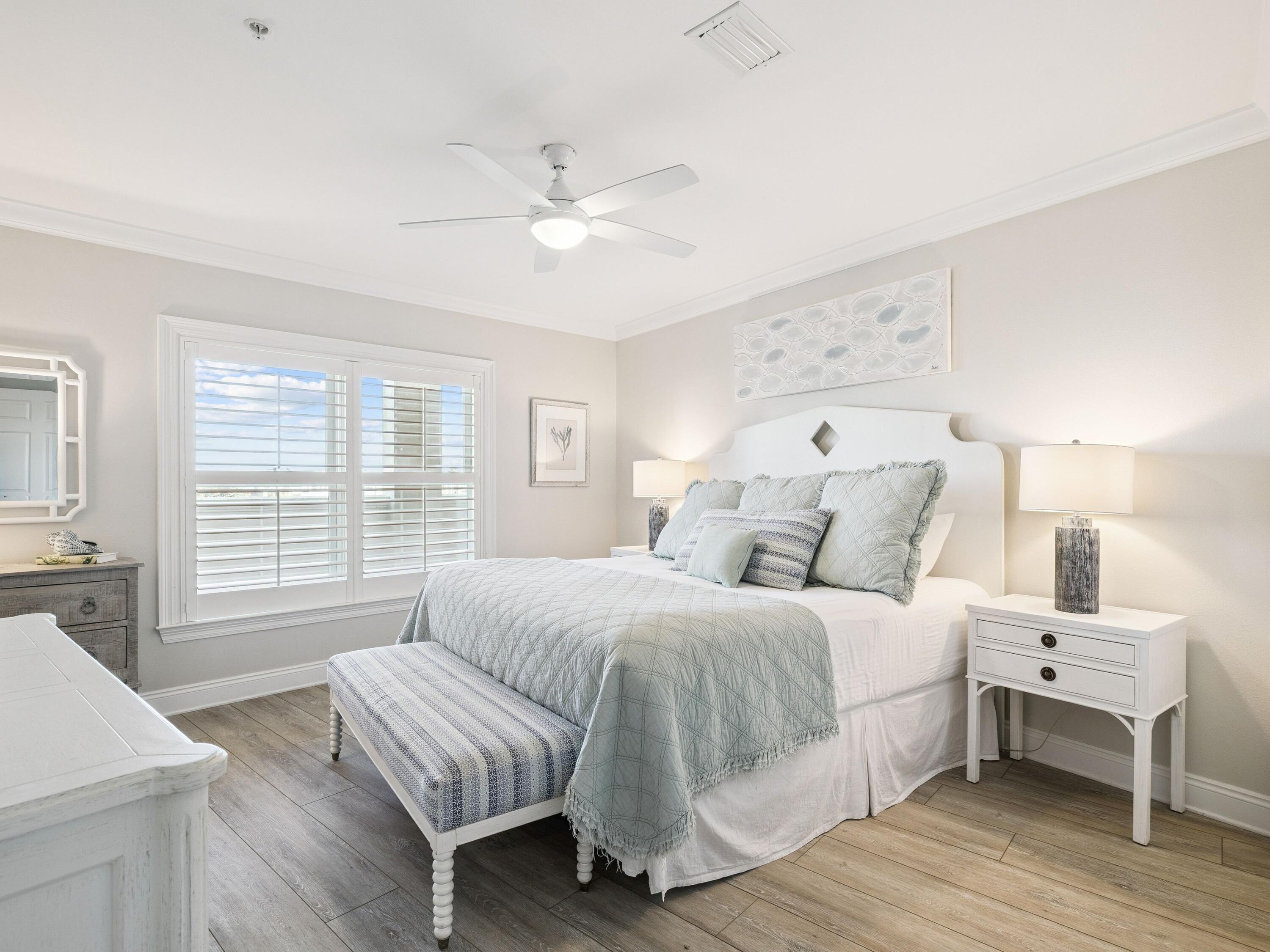 56 Blue Mountain Road, Unit B304 Santa Rosa Beach, FL 32459 - Photo 19 of 47 a bedroom with a bed and a window