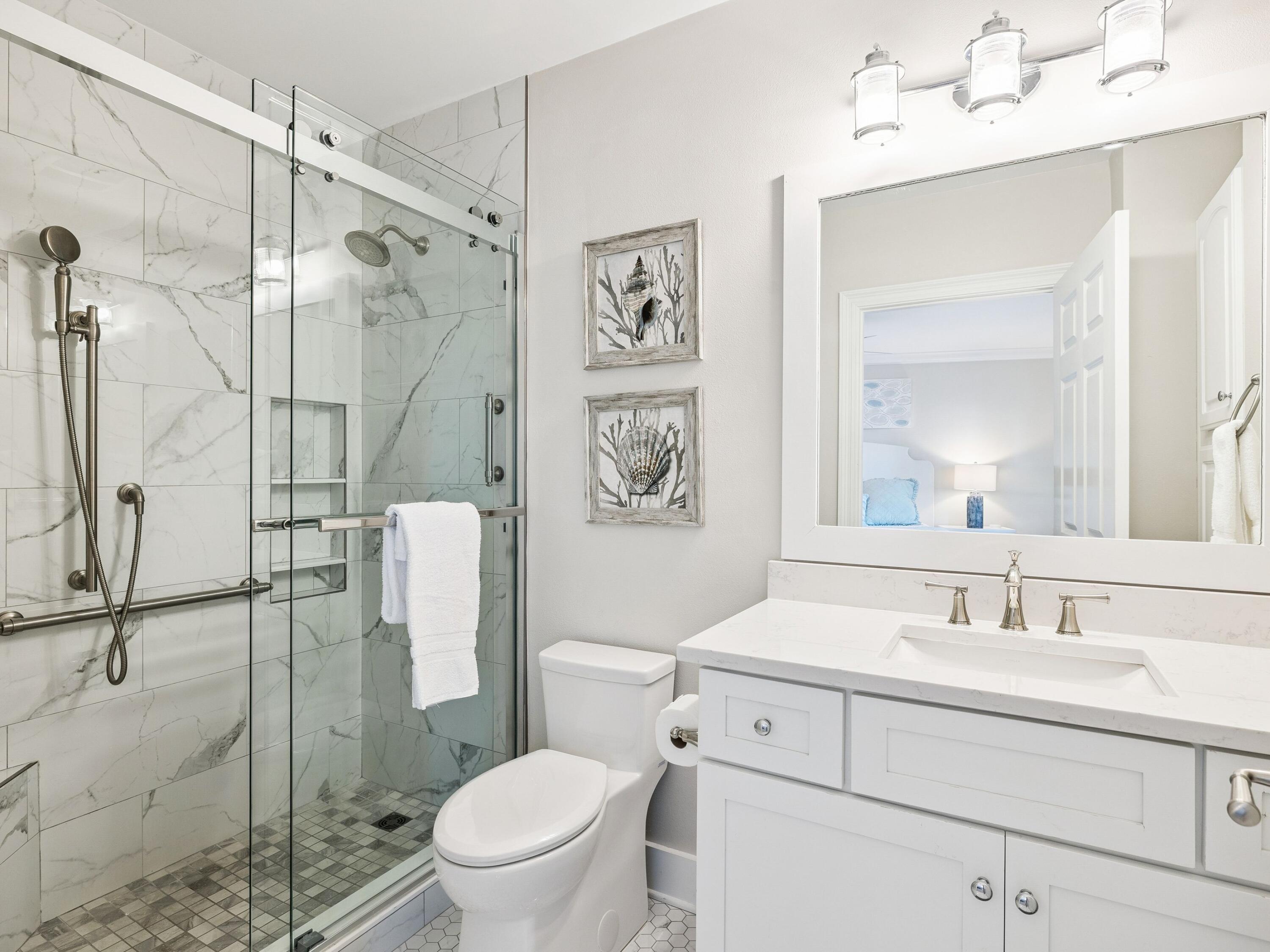 56 Blue Mountain Road, Unit B304 Santa Rosa Beach, FL 32459 - Photo 21 of 47 a bathroom with a sink toilet and shower