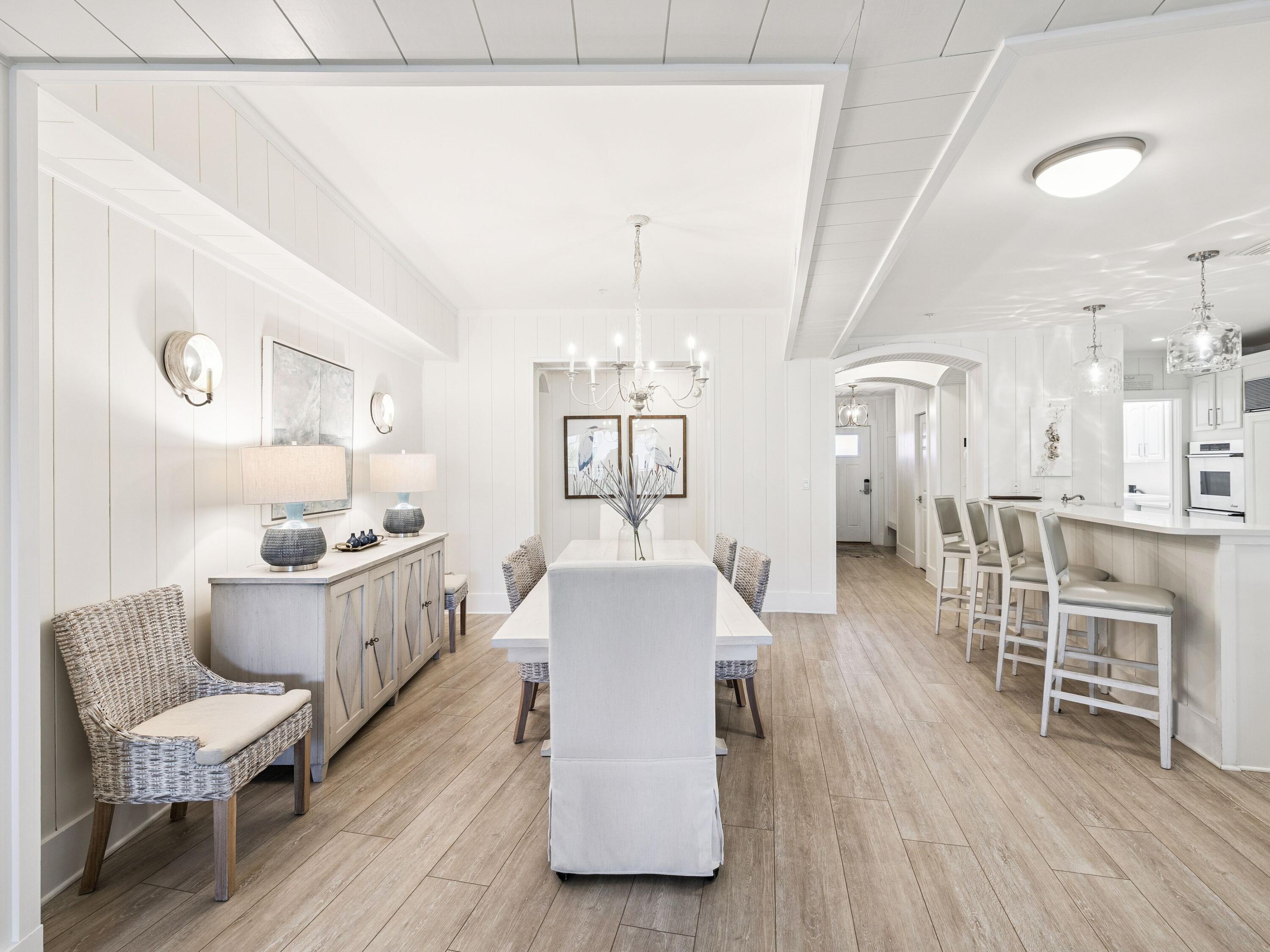 56 Blue Mountain Road, Unit B304 Santa Rosa Beach, FL 32459 - Photo 24 of 47 a living room with furniture and a wooden floor
