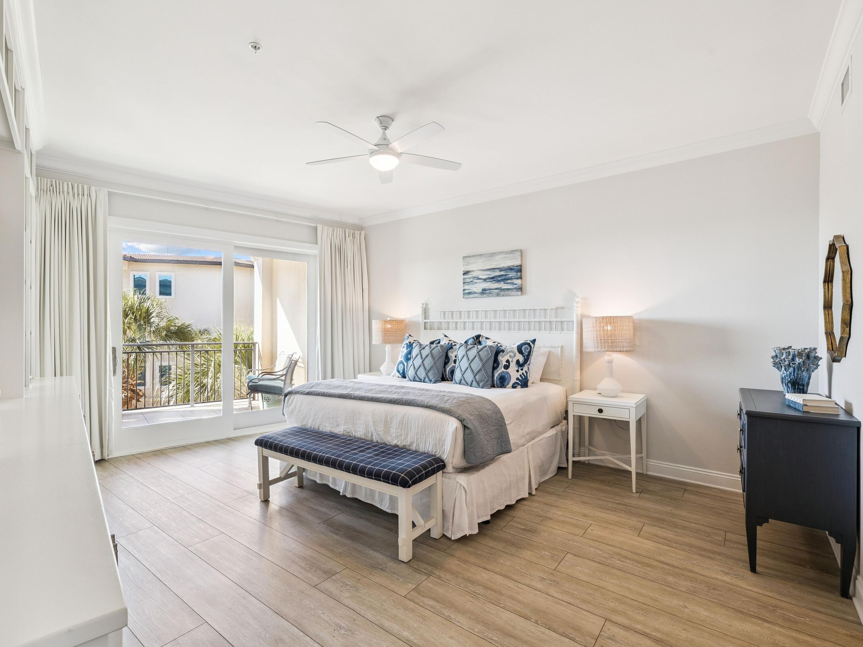 56 Blue Mountain Road, Unit B304 Santa Rosa Beach, FL 32459 - Photo 27 of 47 a spacious bedroom with a bed and a window