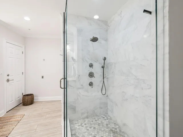 a bathroom with a double vanity sink and mirror
