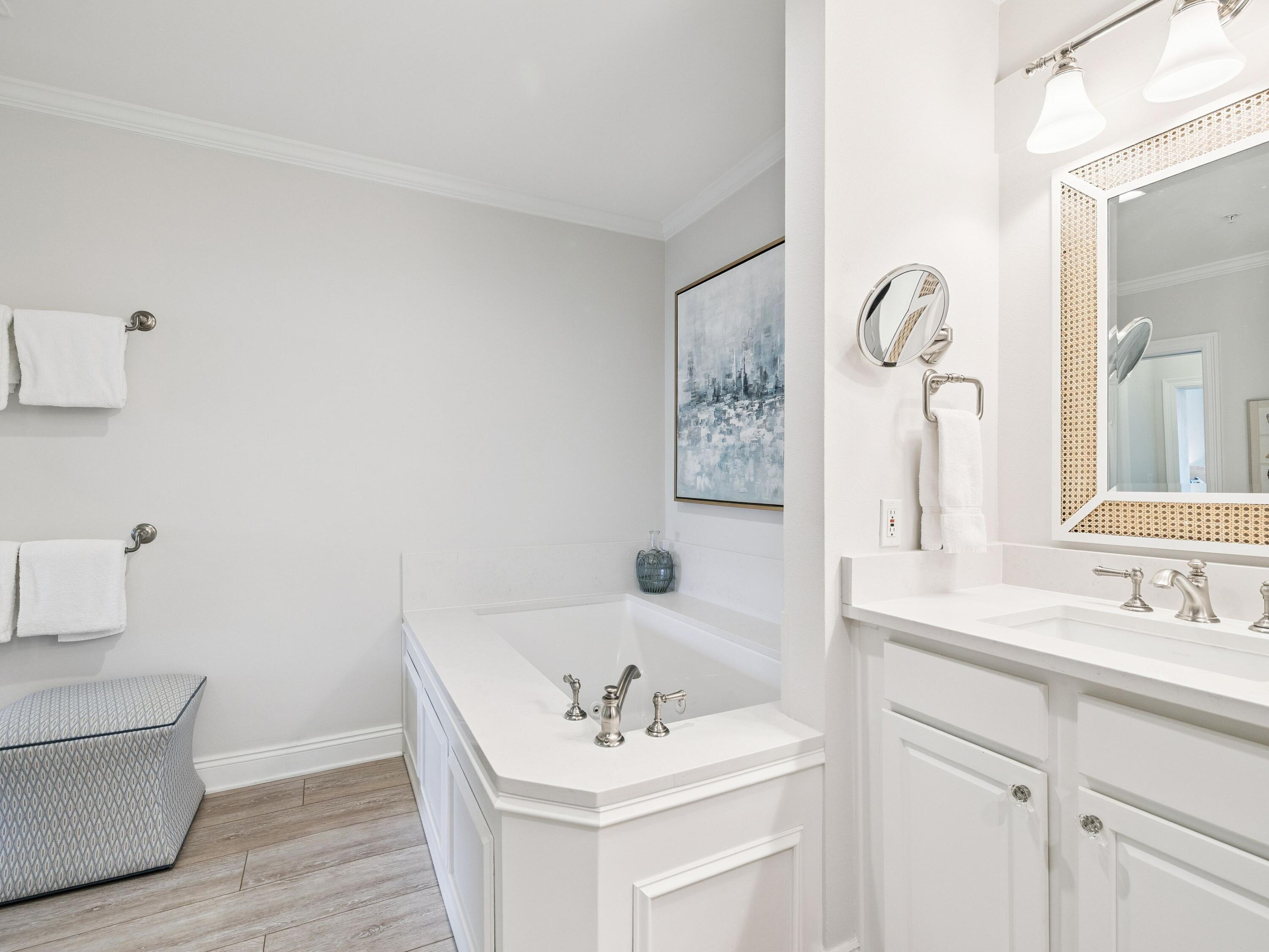 56 Blue Mountain Road, Unit B304 Santa Rosa Beach, FL 32459 - Photo 30 of 47 a bathroom with a sink and a mirror