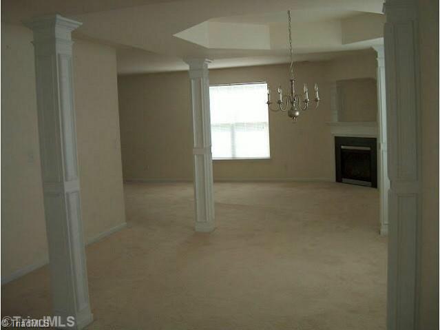 2161 Rindle Drive High Point, NC 27262 - Photo 3 of 4 Interior Space/Layout. Living room, dining room, and den all in one large open space accented with columns.
