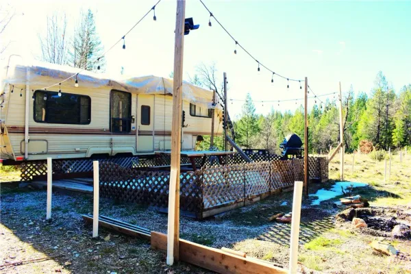 a view of backyard space and trees