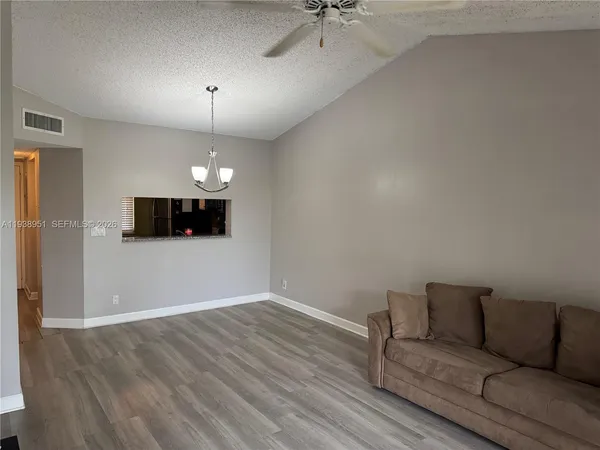 a bathroom with a glass door shower