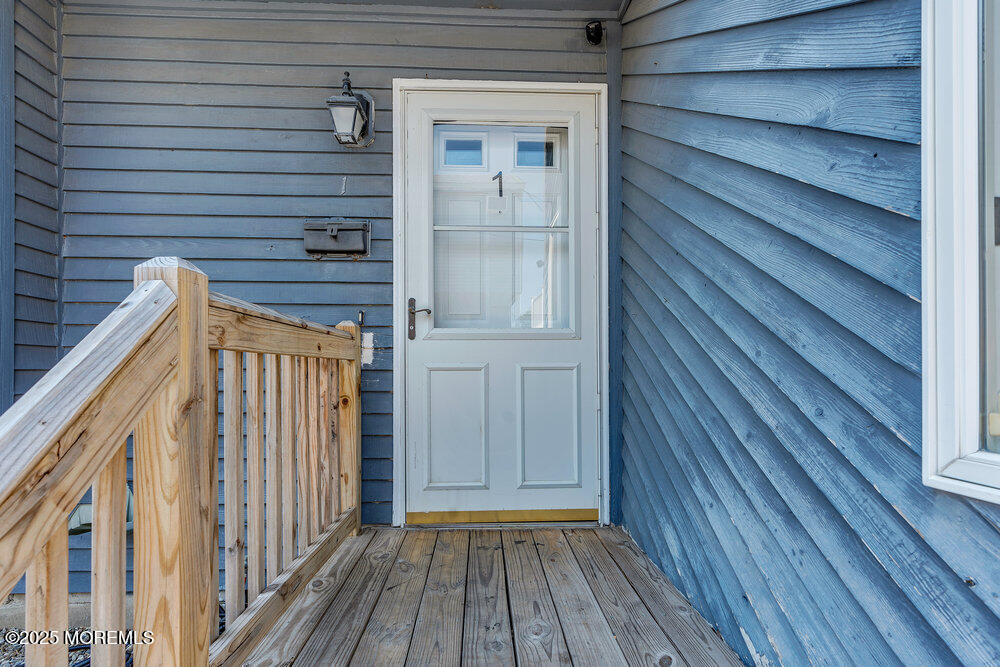 62 Sherman Avenue, Unit A1 Seaside Heights, NJ 08751 - Photo 4 of 17 a view of wooden floor in a house