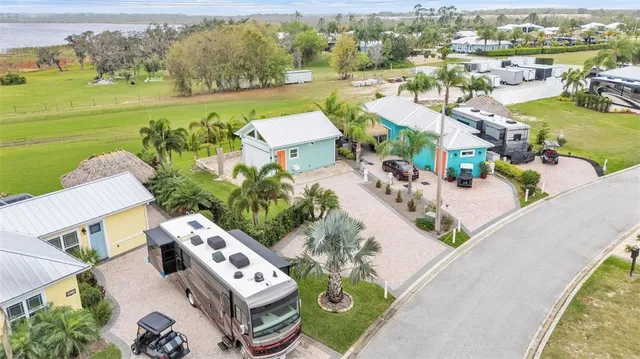 an aerial view of a house with outdoor space