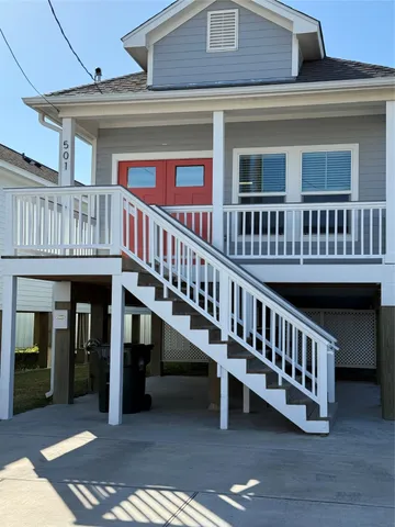 a view of a house with roof deck