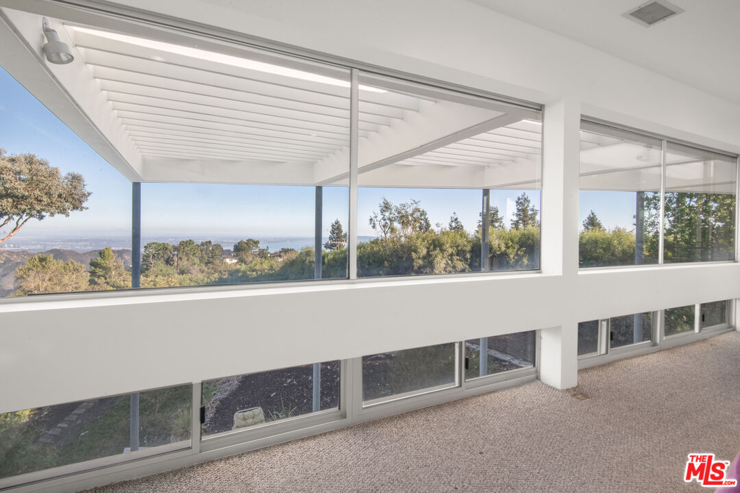 21839 Saddle Peak Road Topanga, CA 90290 - Photo 21 of 72 a view of an empty room with a window