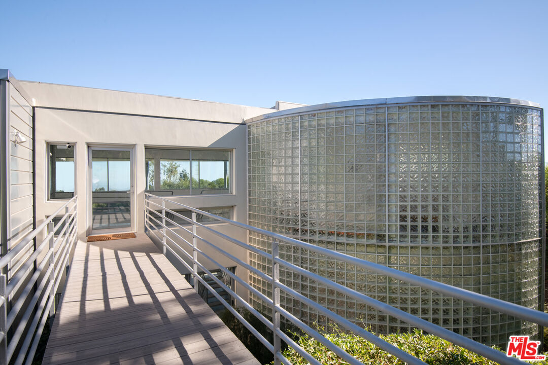 21839 Saddle Peak Road Topanga, CA 90290 - Photo 45 of 72 a view of balcony with wooden floor