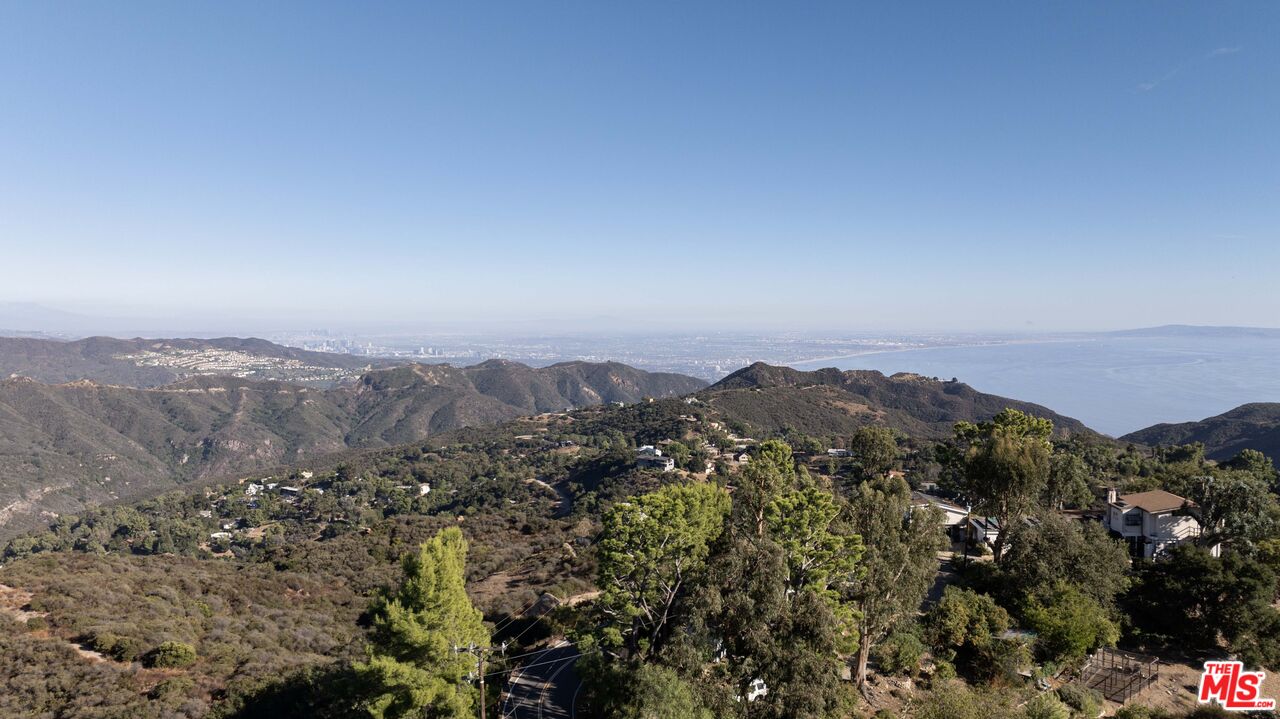 21839 Saddle Peak Road Topanga, CA 90290 - Photo 68 of 72 an aerial view of mountain with trees around