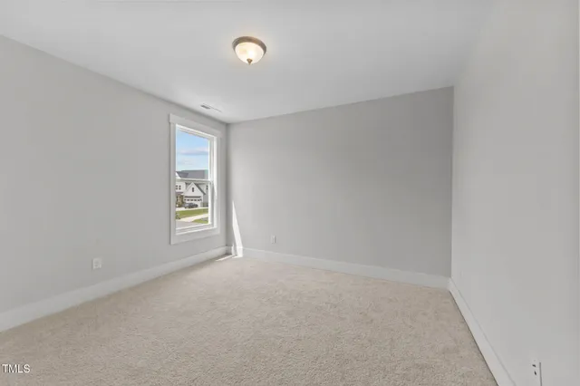 a bathroom with a toilet a sink a mirror a bathtub and vanity