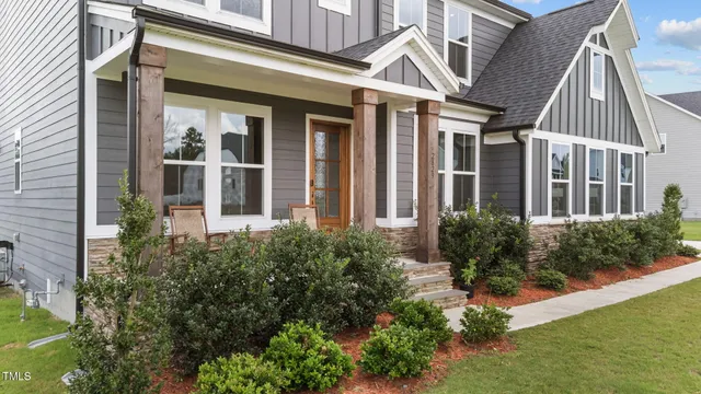 front view of a house with a yard