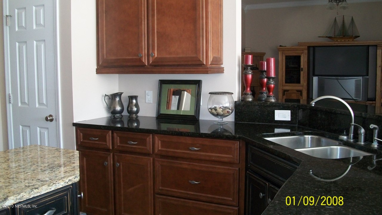 6588 Sandsdale Road Macclenny, FL 32063 - Photo 14 of 25 View of kitchen looking into living room