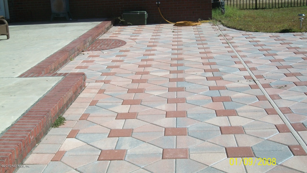 6588 Sandsdale Road Macclenny, FL 32063 - Photo 3 of 25 Pavers surrounding pool area