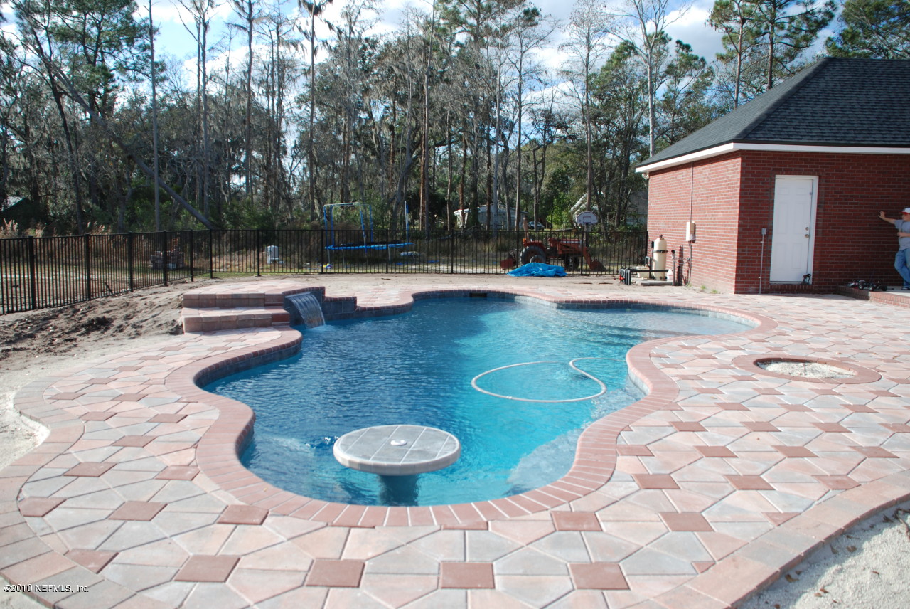 6588 Sandsdale Road Macclenny, FL 32063 - Photo 4 of 25 Pool area with sod