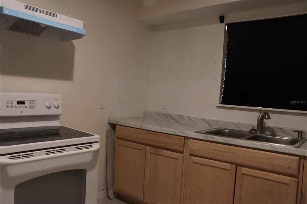 19791 Southwest 108th Lane Dunnellon, FL 34432 - Photo 16 of 19 a utility room with sink dryer and washer