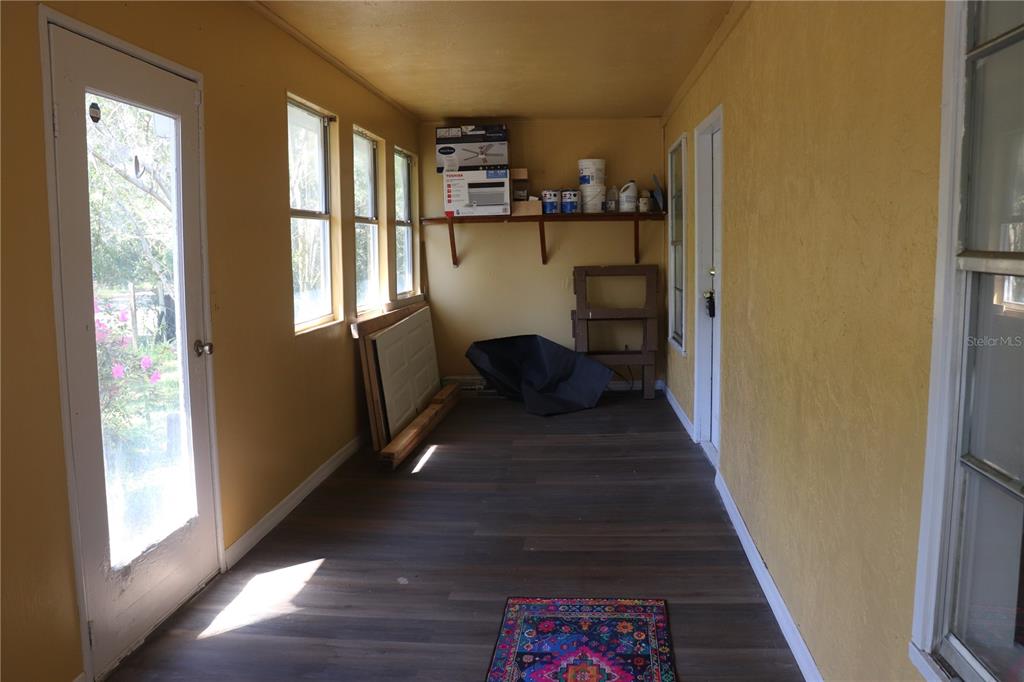 19791 Southwest 108th Lane Dunnellon, FL 34432 - Photo 6 of 19 a view of entryway and hall with wooden floor