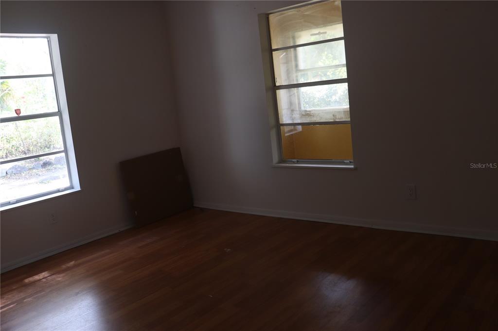 19791 Southwest 108th Lane Dunnellon, FL 34432 - Photo 7 of 19 an empty room with a window