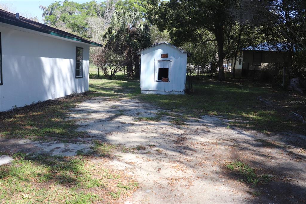 19791 Southwest 108th Lane Dunnellon, FL 34432 - Photo 10 of 19 a front view of a house with a yard
