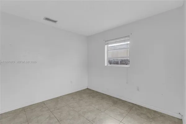 a bathroom with a sink toilet a mirror and shower