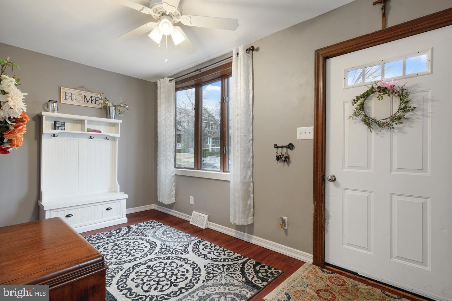 Large entry foyer/sunroom - you choose.