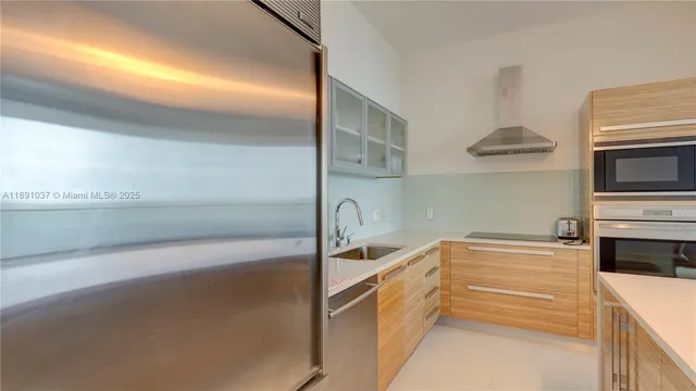 a view of a glass door with a floor to ceiling window