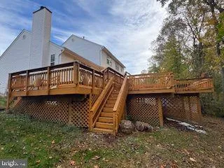 a view of stairs and wooden fence