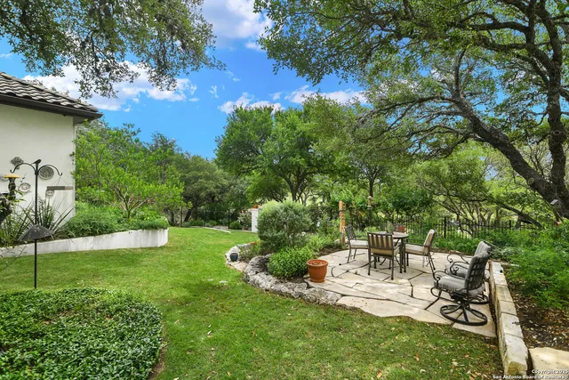 a backyard of a house with lots of green space