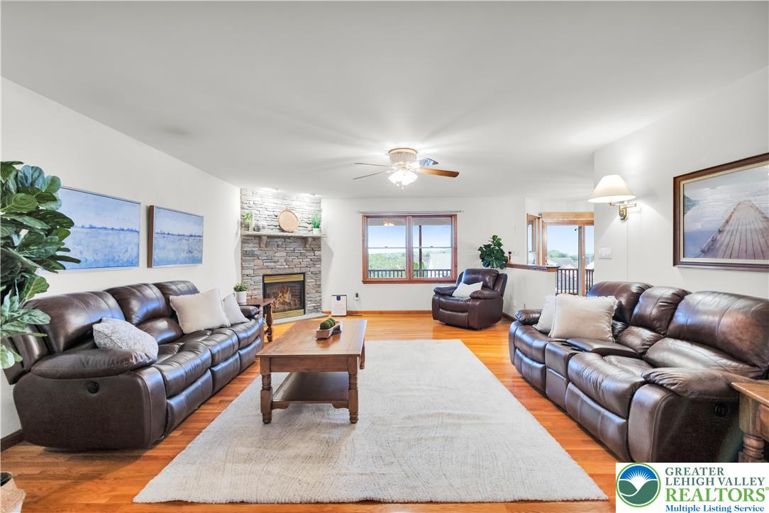 461 East Beil Avenue Nazareth, PA 18064 - Photo 12 of 64 a living room with furniture fireplace and a large window