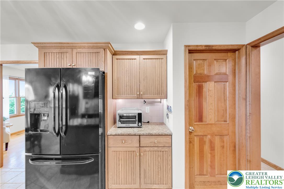 461 East Beil Avenue Nazareth, PA 18064 - Photo 18 of 64 a kitchen with stainless steel appliances a refrigerator and cabinets