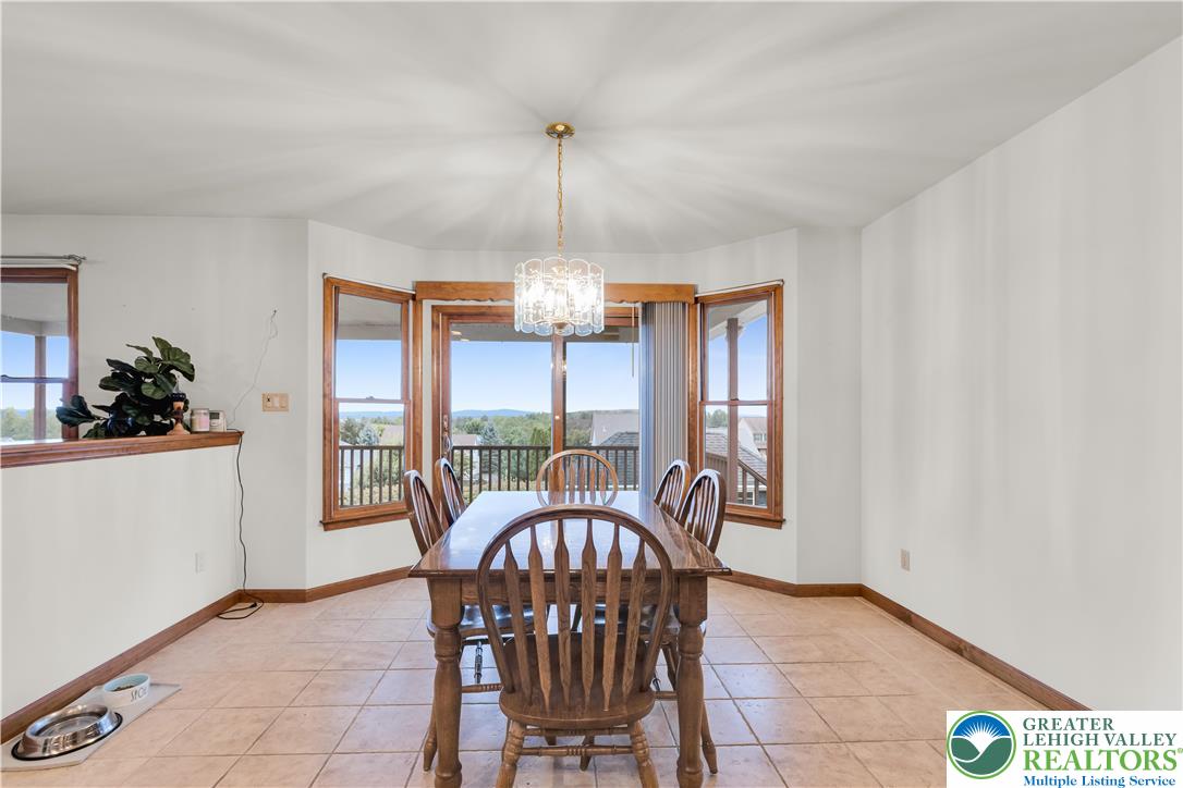 461 East Beil Avenue Nazareth, PA 18064 - Photo 20 of 64 a dining room with furniture a chandelier and window