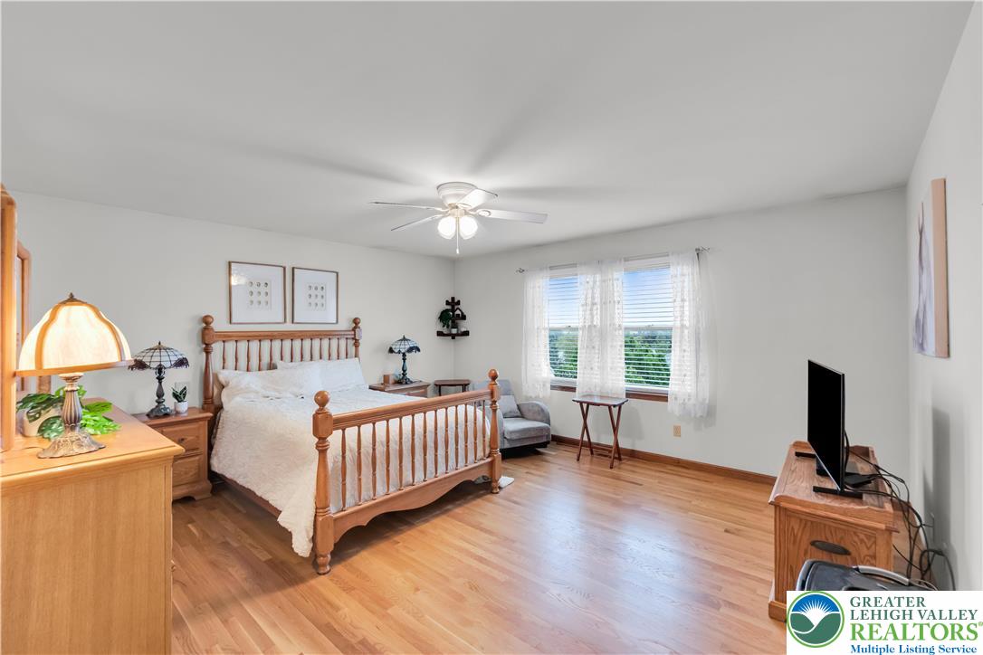 461 East Beil Avenue Nazareth, PA 18064 - Photo 26 of 64 a bedroom with furniture and a wooden floor