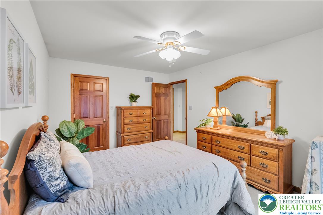 461 East Beil Avenue Nazareth, PA 18064 - Photo 30 of 64 a bedroom with a bed and ceiling fan