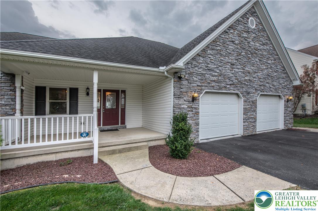 461 East Beil Avenue Nazareth, PA 18064 - Photo 3 of 64 a front view of a house with garden