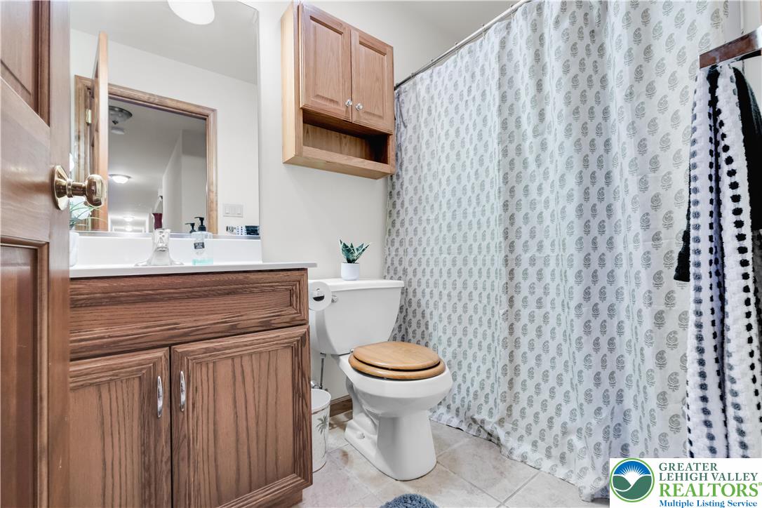 461 East Beil Avenue Nazareth, PA 18064 - Photo 35 of 64 a bathroom with a sink a toilet and a mirror