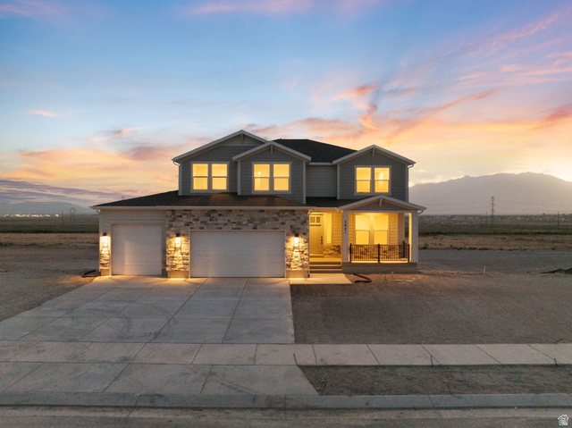 2821 Scarlet Road, Unit 149 Eagle Mountain, UT 84005 - Photo 1 of 28 Our two-story "Magnolia" with large covered porch and beautiful mountain views.