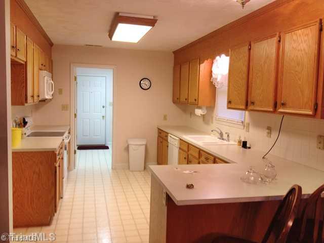 501 Ridgeway Lane Lexington, NC 27295 - Photo 5 of 16 Kitchen. Abundant cabinets in this working kitchen.