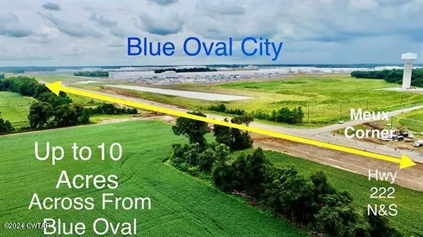 a view of a park with an ocean view