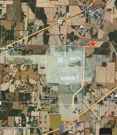 a aerial view of a house with outdoor space