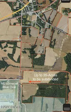 a view of a fountain in front of a house