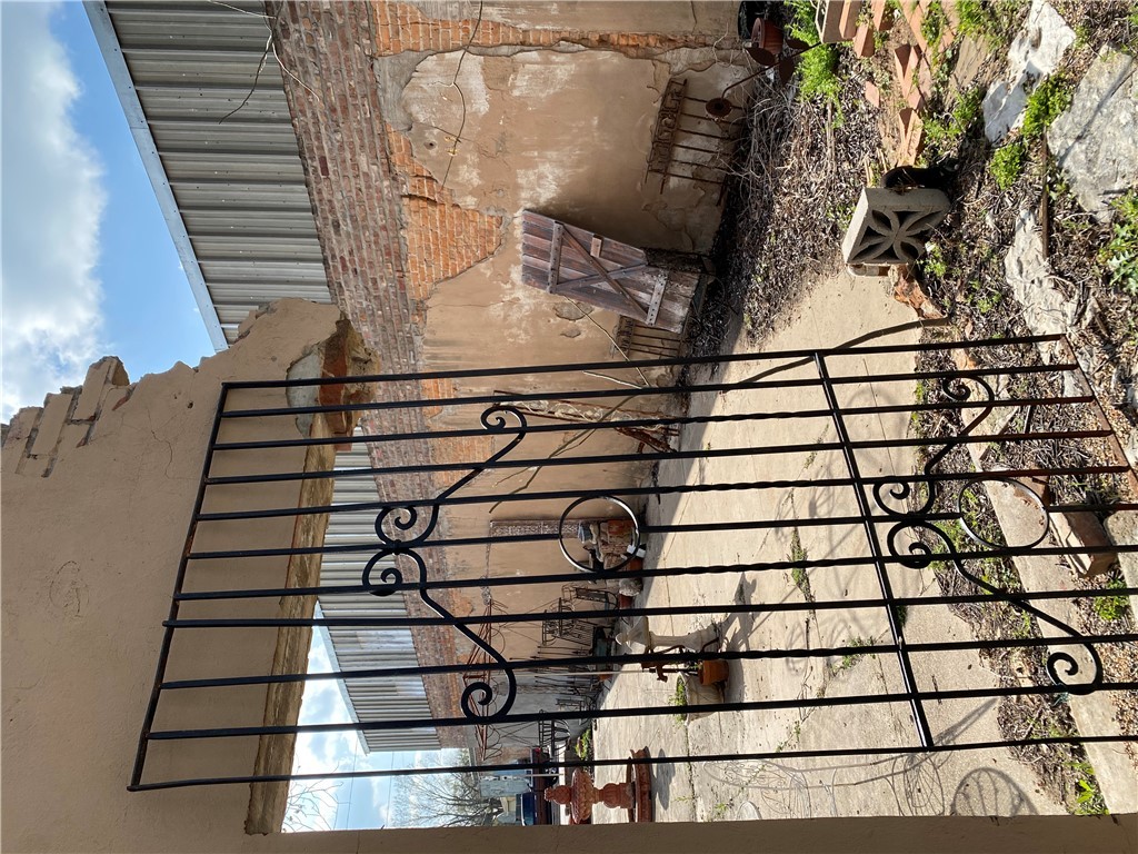 720 South Main Calvert, TX 77837 - Photo 14 of 22 a view of a porch