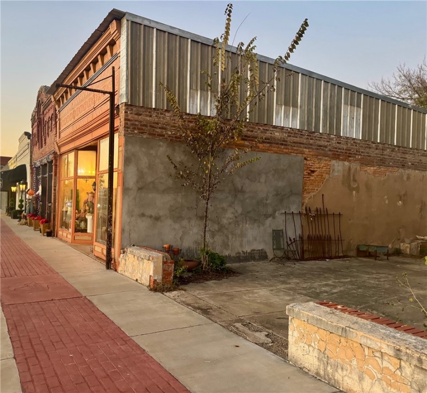 720 South Main Calvert, TX 77837 - Photo 7 of 22 a view of a house with a backyard