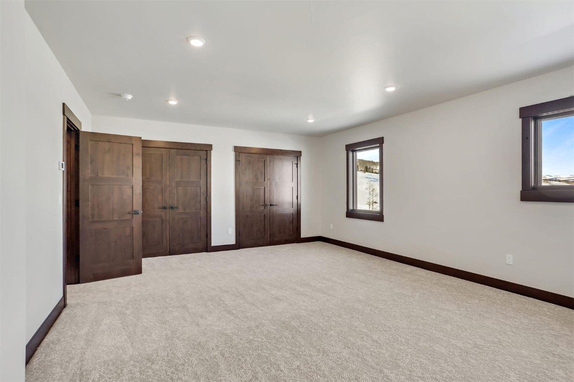 62 Vendette Road Silverthorne, CO 80498 - Photo 21 of 35 a view of an empty room with windows