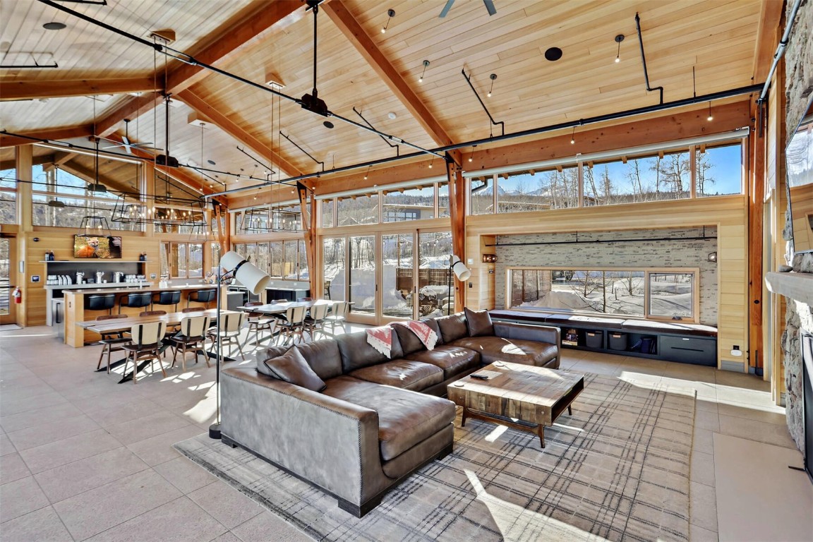 62 Vendette Road Silverthorne, CO 80498 - Photo 31 of 35 a living room with furniture and a large window