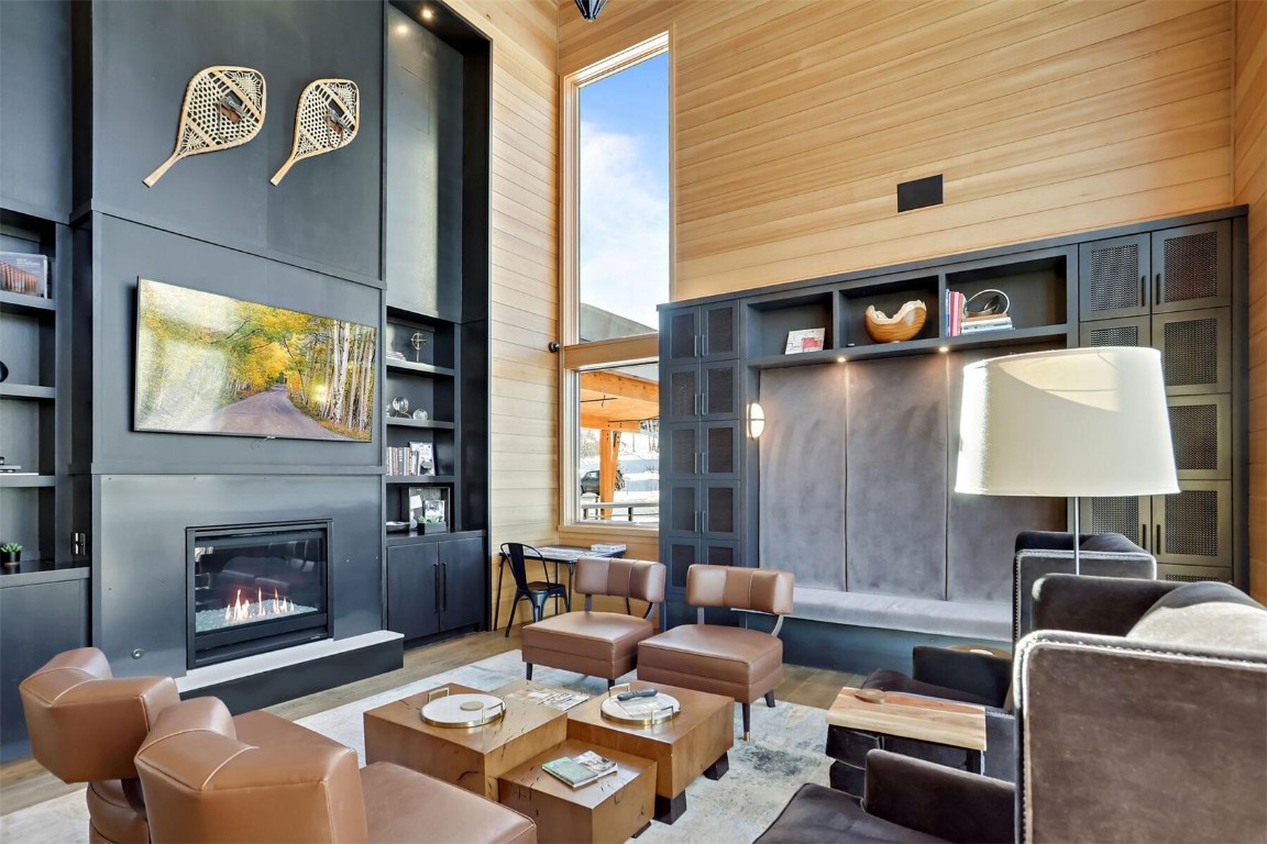 62 Vendette Road Silverthorne, CO 80498 - Photo 34 of 35 a living room with furniture and a fireplace